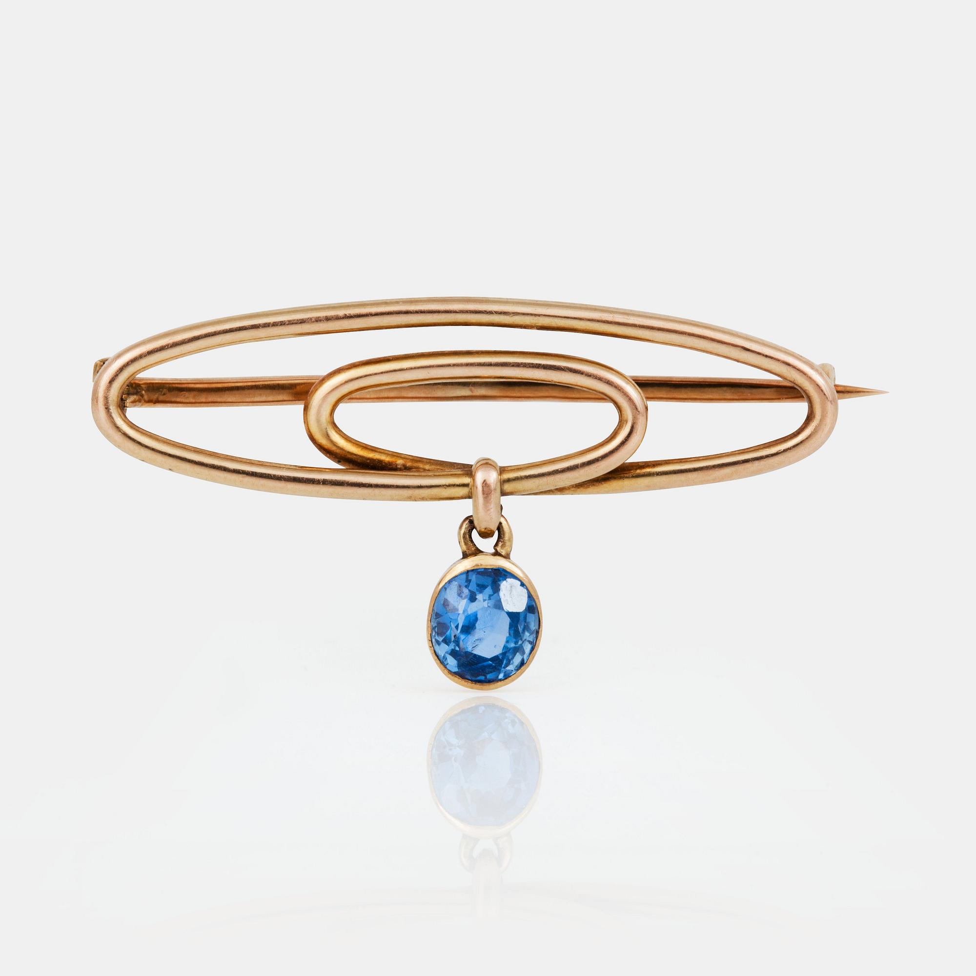 BROSCH, troligen Agaton Fabergé, guldtråd med safir, ca 1.20 ct. Ryska stämplar.