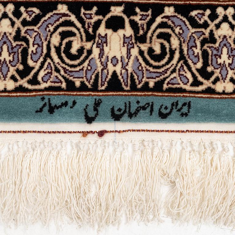 A signed pictoral Isfahan rug, Central Persia (Iran), signed, c. 235 x 154 cm.