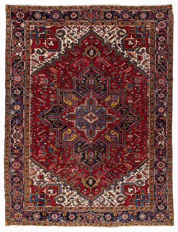A carpet, Heriz, ca 315 x 243 cm.