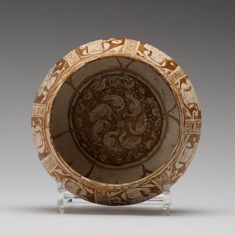 A BOWL, pottery with luster decor, height ca 10,5 cm, Persia/Iran 12th-13th century.