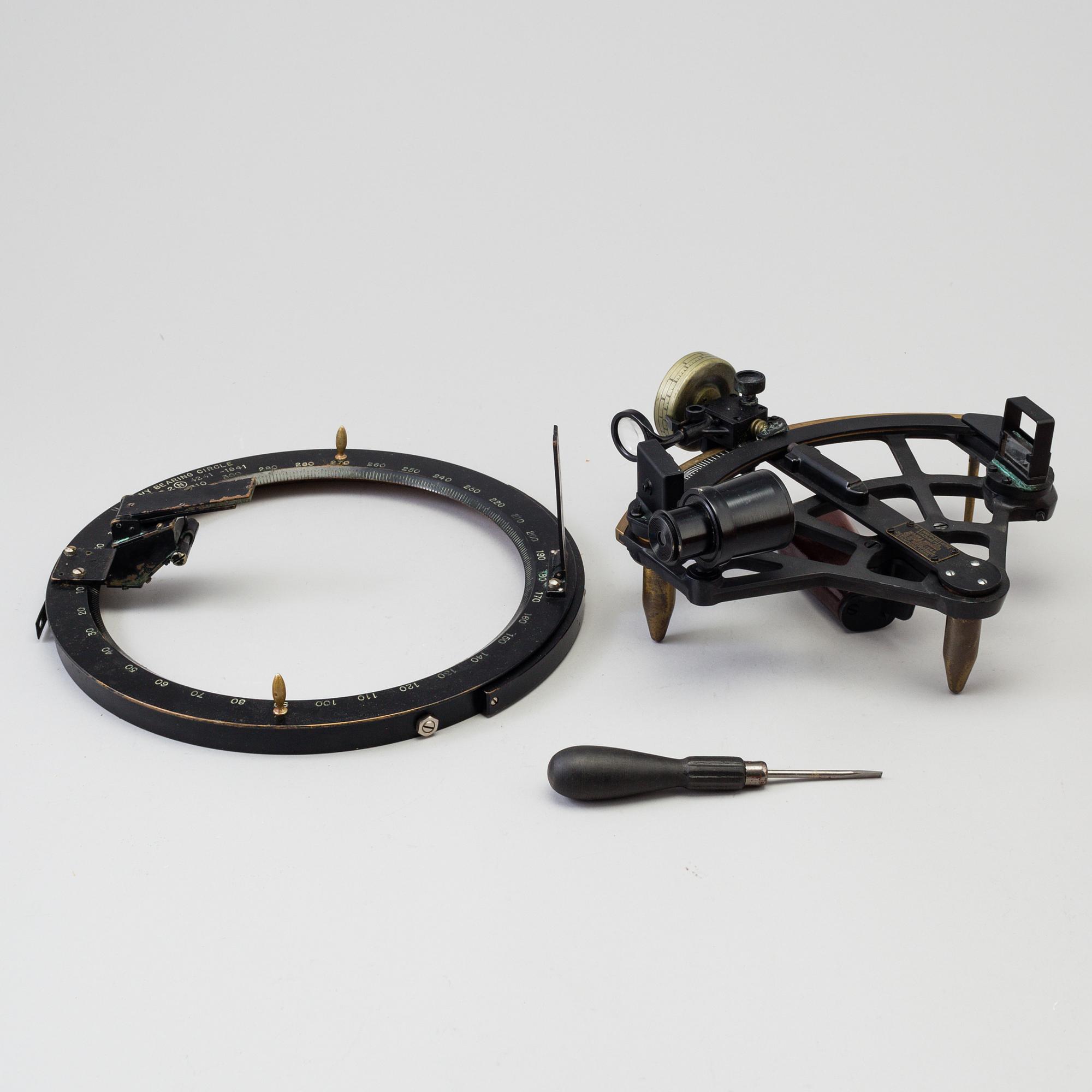 A 20th century Stadimeter and a bearing circle, both in cases. Marked U.S. Navy.