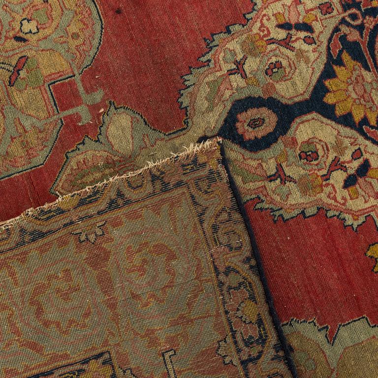 An antique second part of the 19th century Persian carpet ca 182 x112 cm.