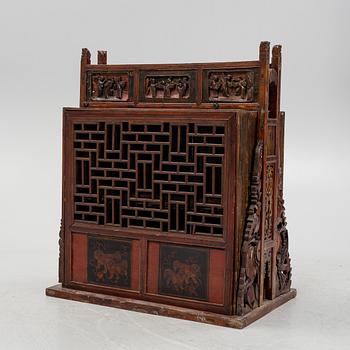 A cabinet, China, 20th century with older parts.