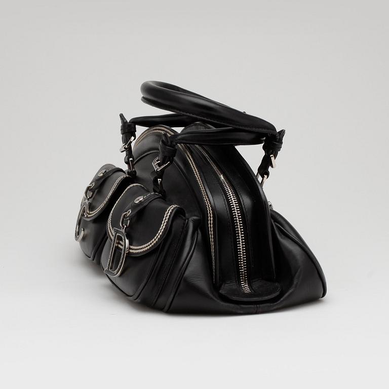 CHRISTIAN DIOR, a black leather handbag.
