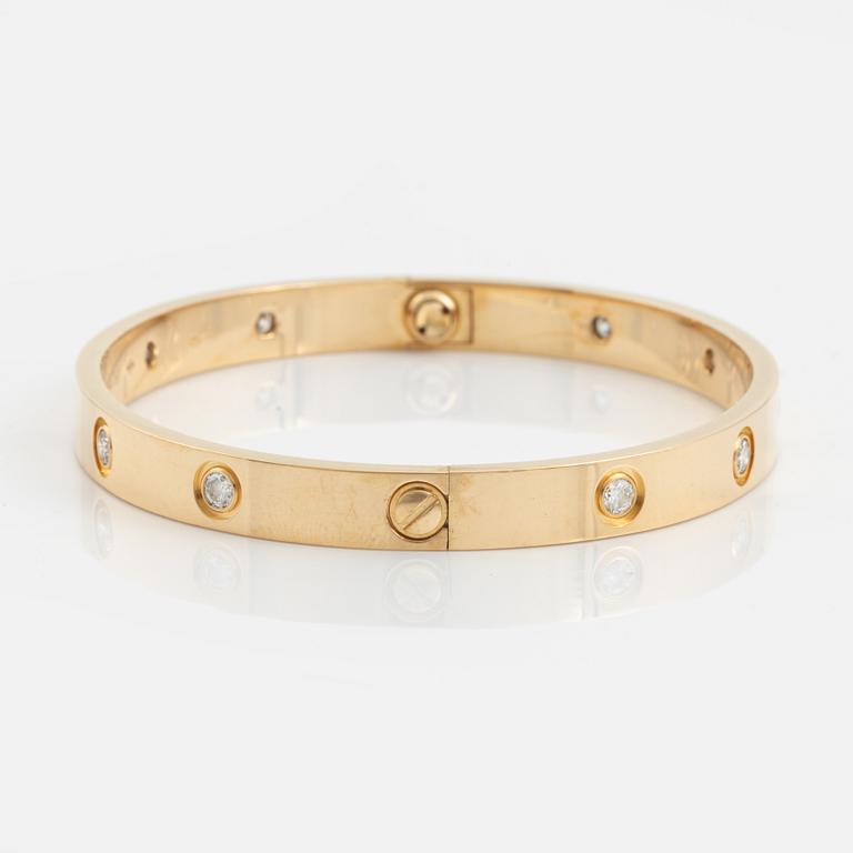 Cartier "Love" armband 18K guld med tio runda briljantslipade diamanter.