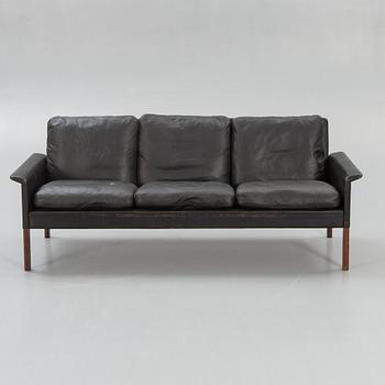 A 1960/70s leather sofa.