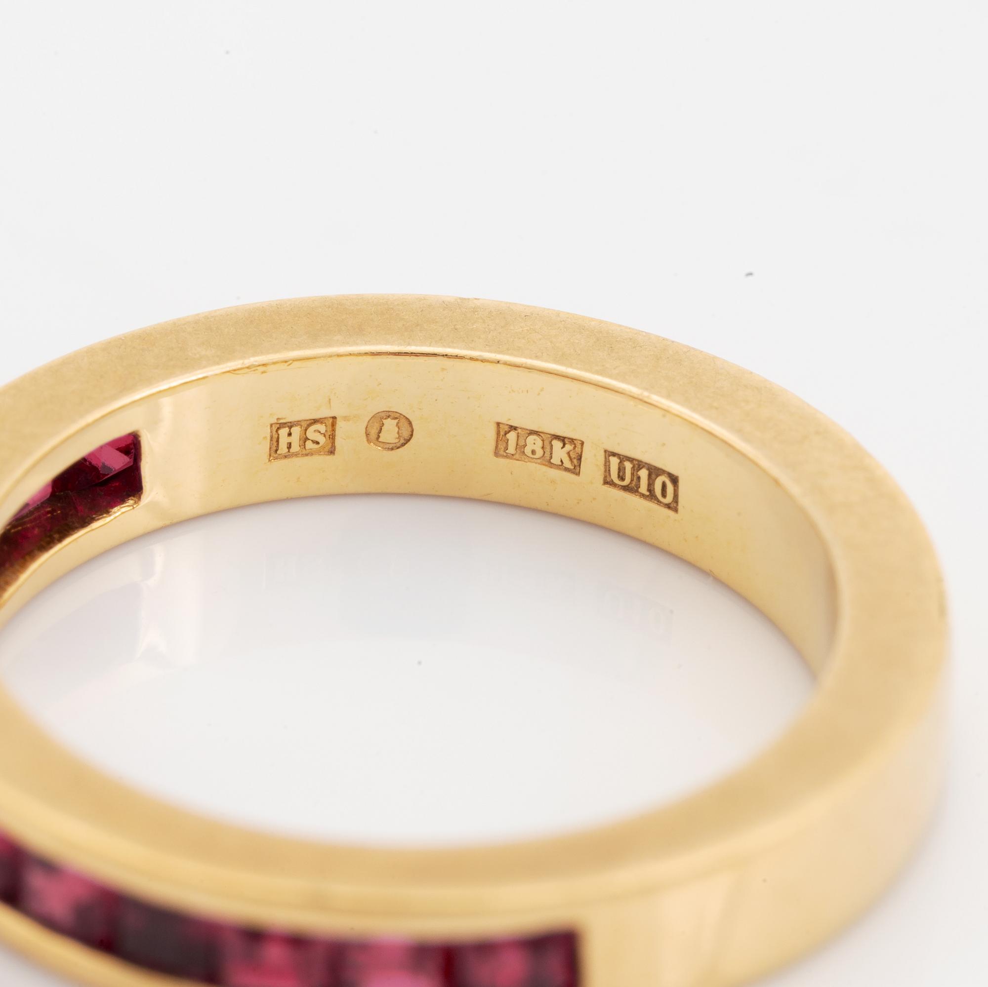 18K gold and step cut ruby ring.