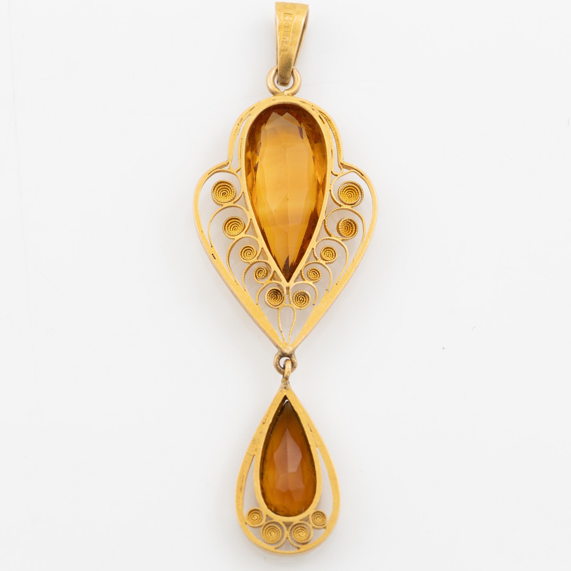 Pendant. 18K gold with citrines.