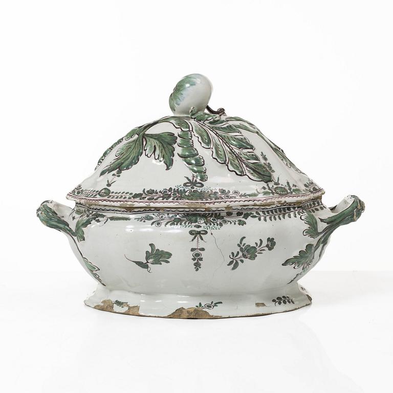 A faience lidded turrine, France, 18th/19th century.
