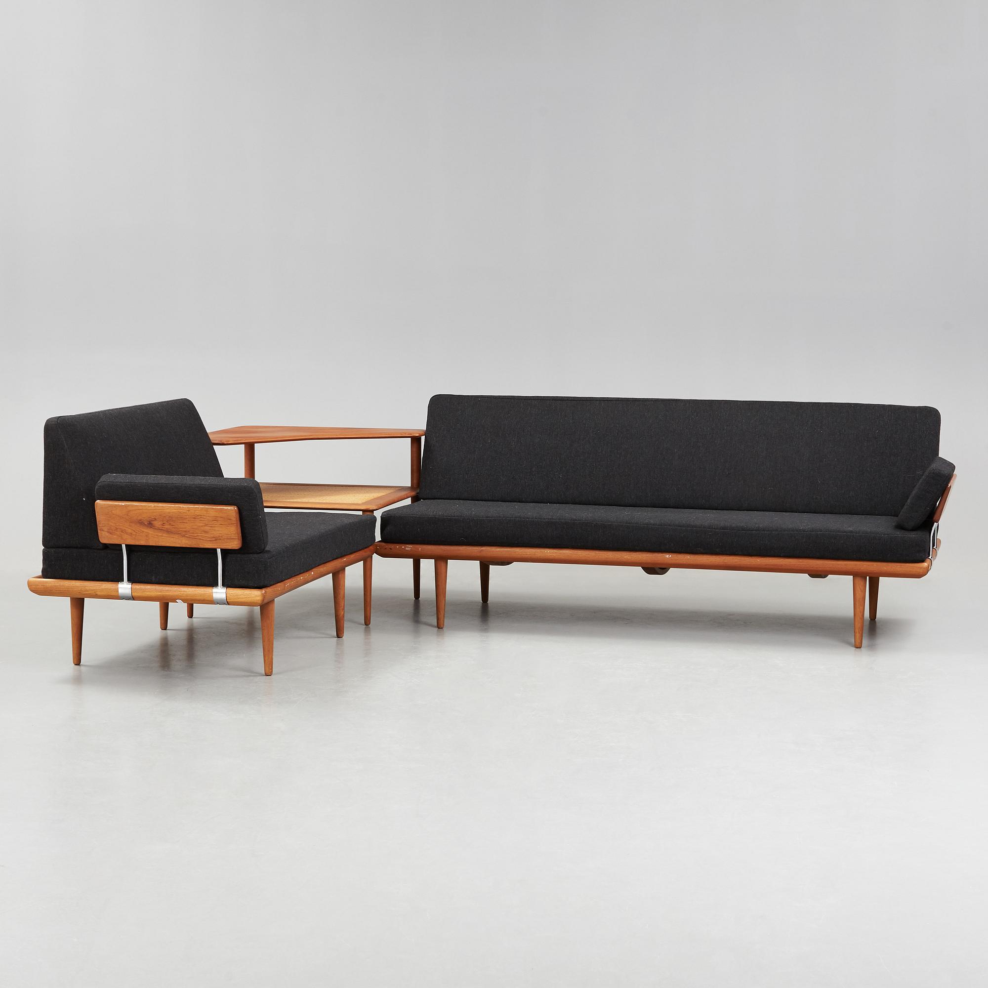 A set of two Danish 'Minerva' sofas with a table for France & Daverkosen.