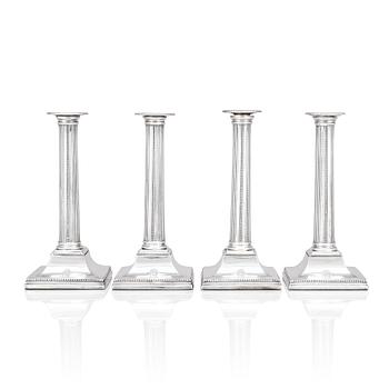 Four English 18th century silver candlesticks, mark of Young, Greaves & Hoyland, Sheffield 1780.