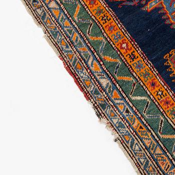 An Oriental runner carpet, circa 347 x 108 cm.