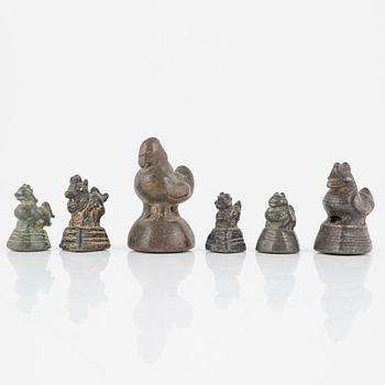 A group of six Burmese opium weights, 19th/20th Century.