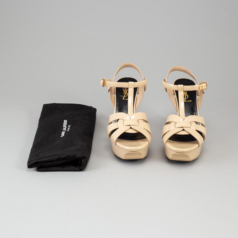 YVES SAINT LAURENT, a pair of open toe patent leather shoes, size 36½.