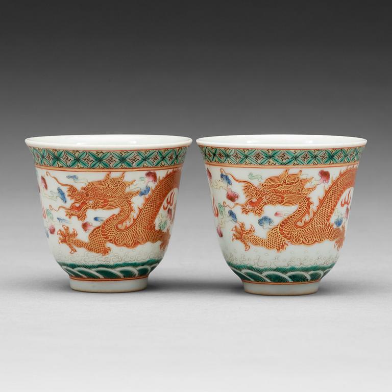 A pair of five clawed dragon cups, Qing dynasty with Xuantongs six character mark and period (1909-11).