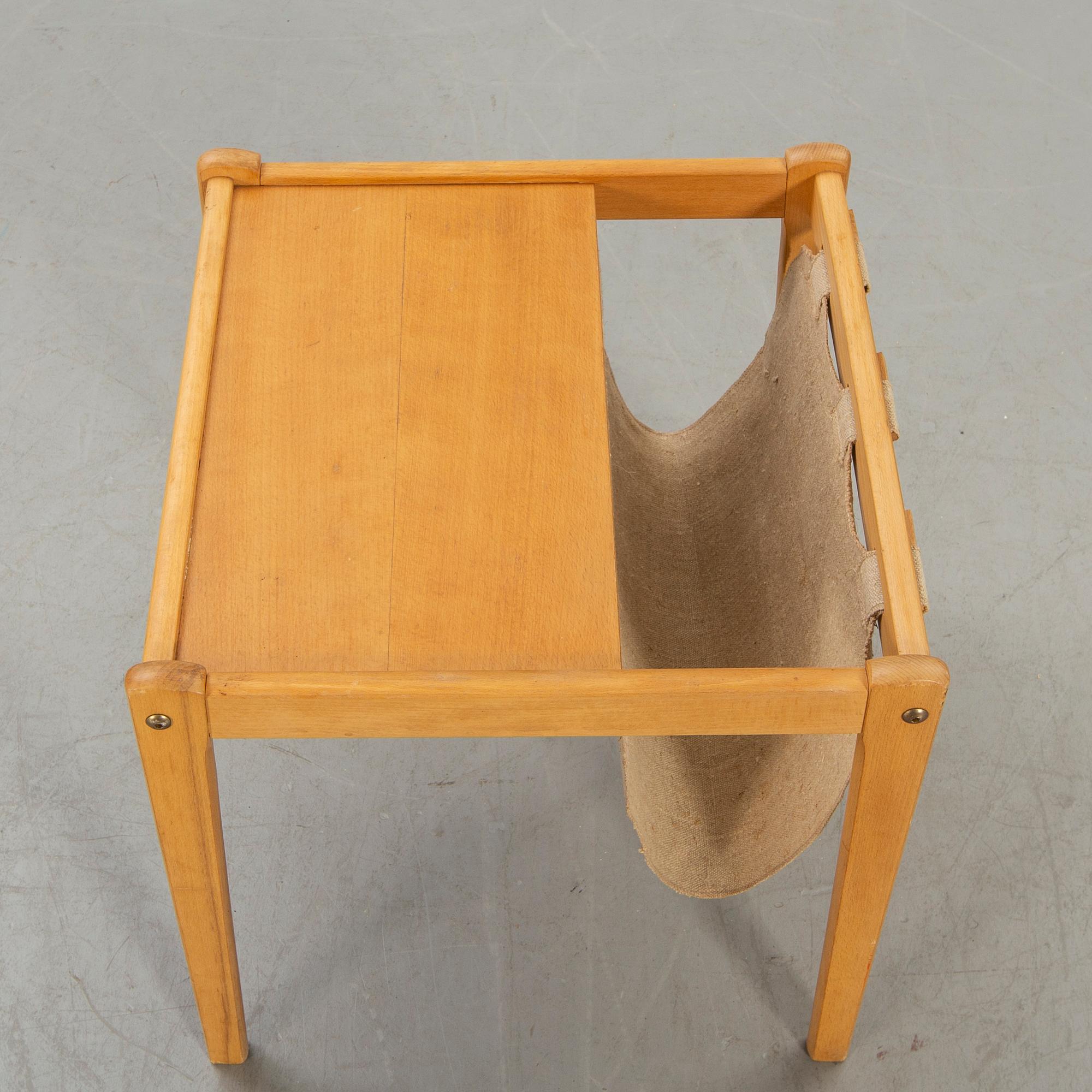A Danish 1960s side table SP Jensen Furbo.