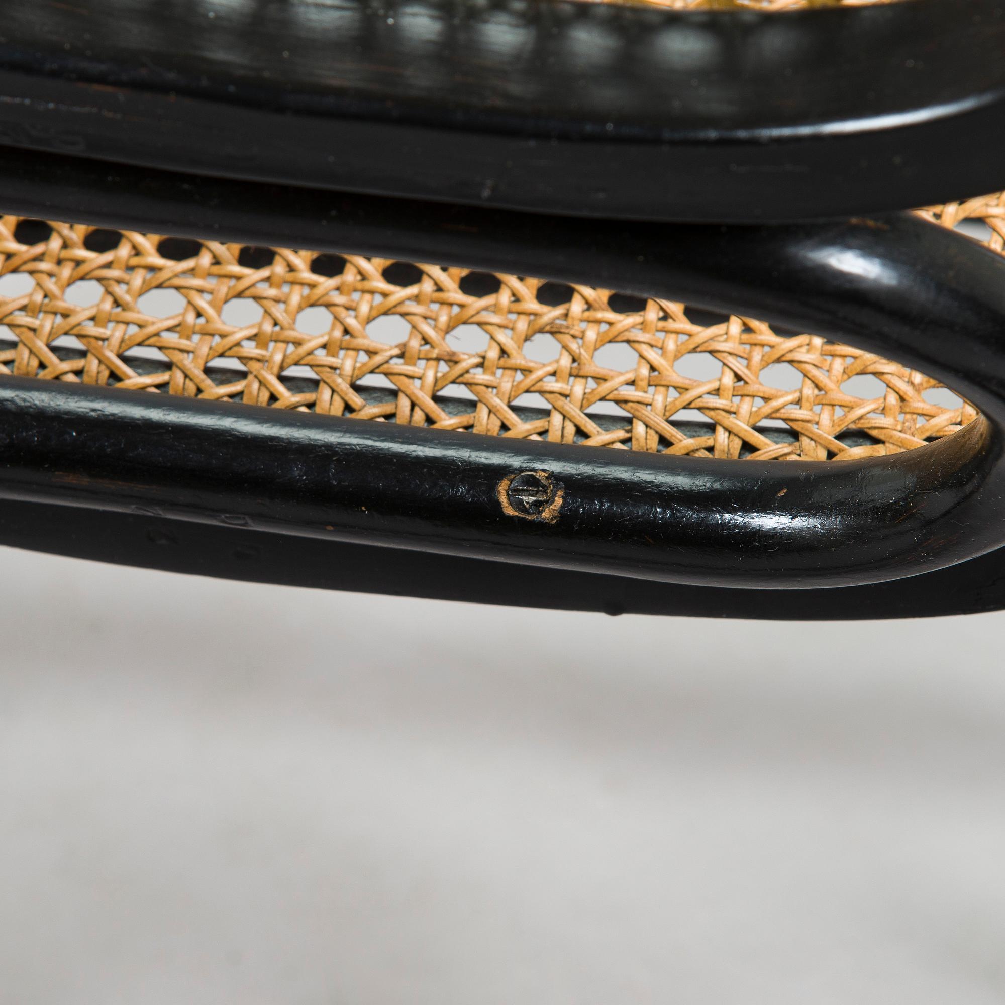 A mid-20th century Thonet style rocking chair.