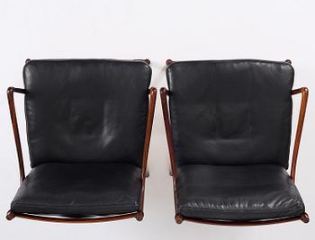 Ole Wanscher, an early pair of rosewood "Colonial Chair" model PJ 149, Poul Jeppesen, Denmark, ca. 1950.
