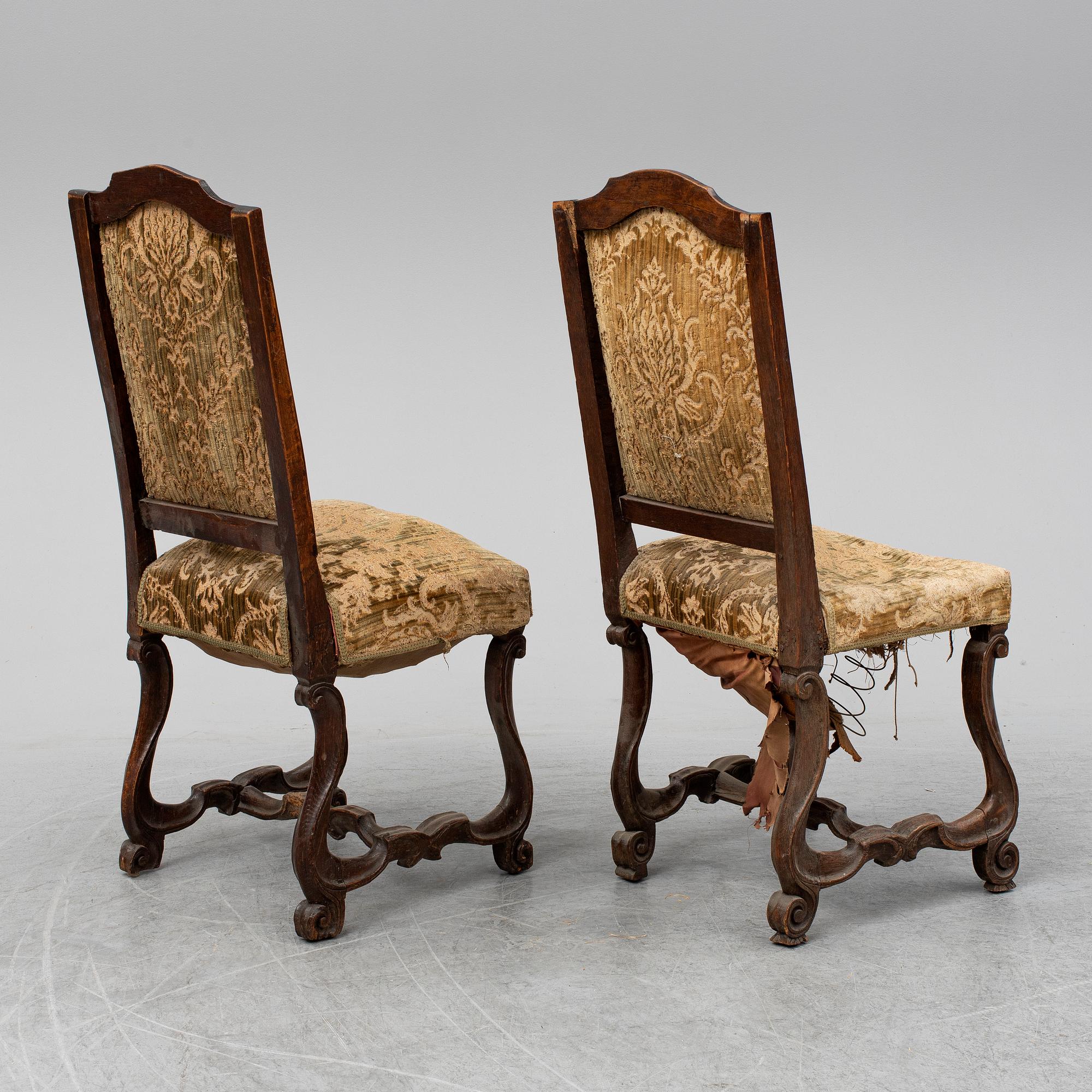 A pair of 18th century chairs.