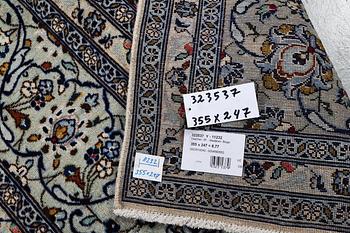 A carpet, Kashan, ca 355 x 247 cm.