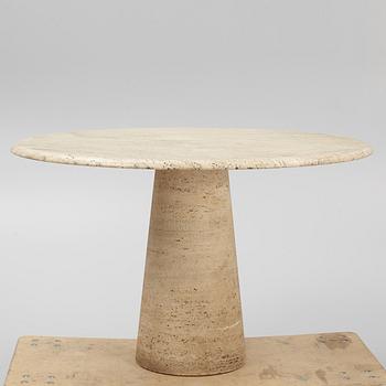 A travertine dining table, late 20th century.