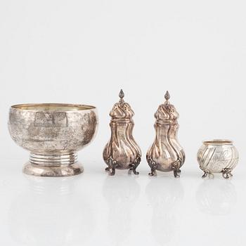 A pair of silver sugar shakers and two bowls, including GAB, Stockholm.