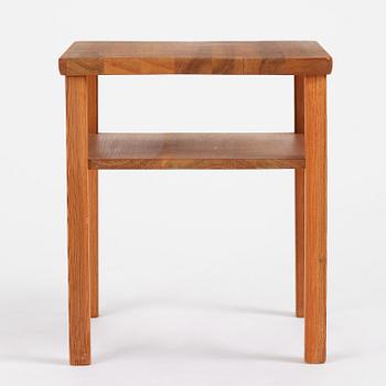Axel Einar Hjorth, a stained pine "Värmdö" table, Nordiska Kompaniet, Sweden, 1930s.