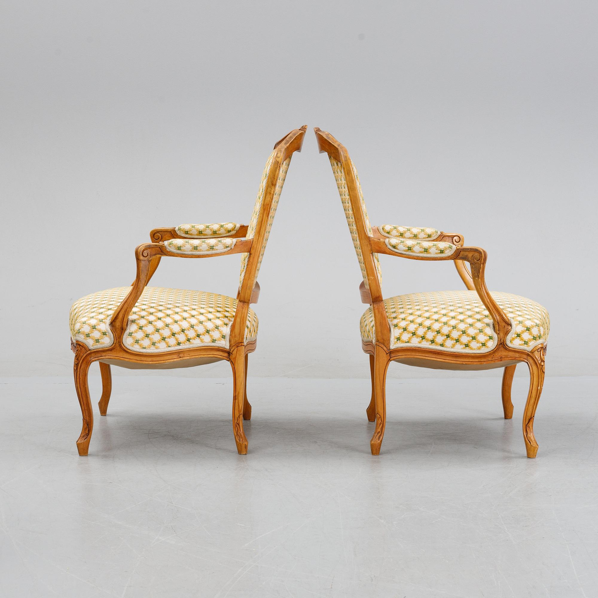 A pair of rococo style armchairs, early 20th Century.