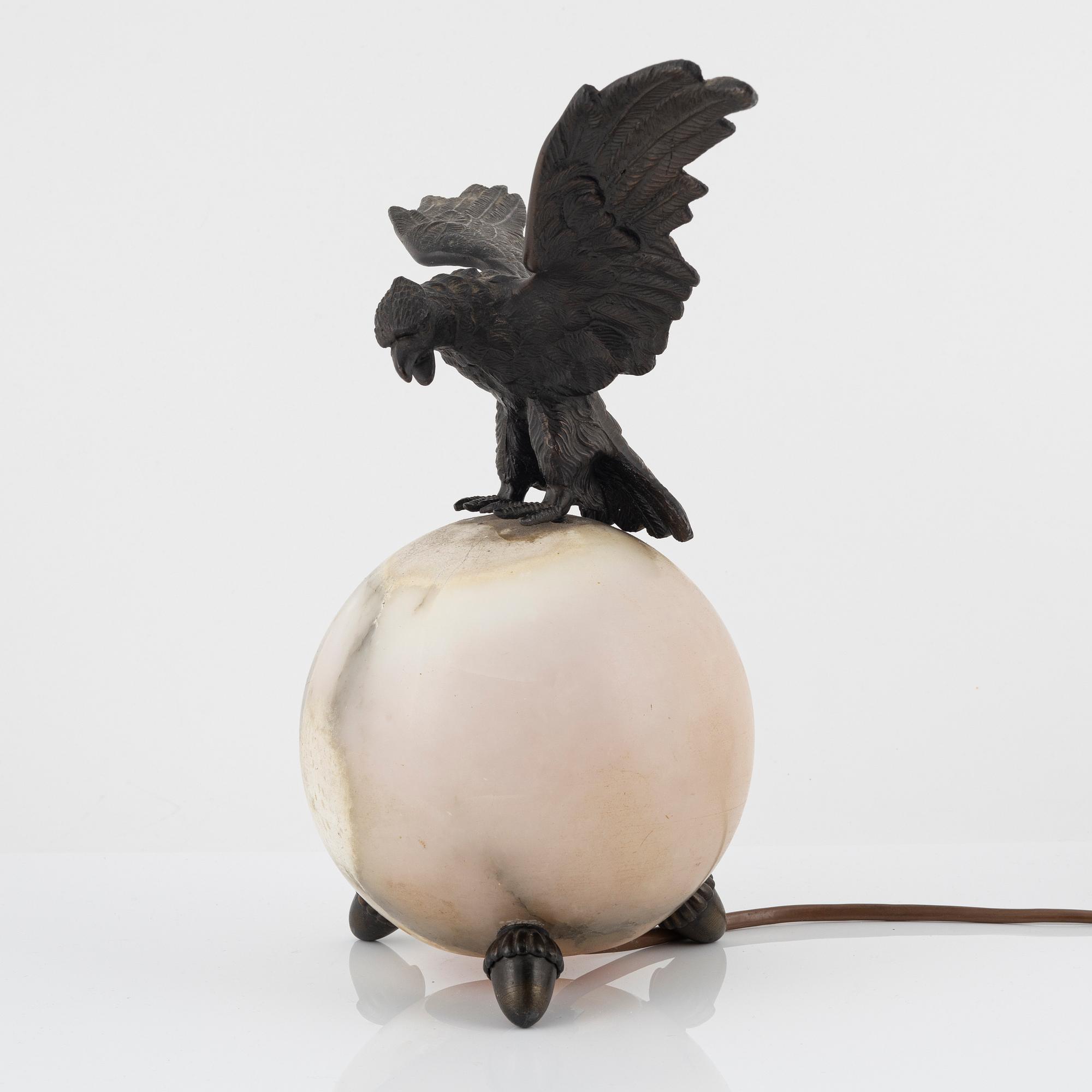 An onyx and bronze Empire style table lamp,  first half of the 20th century.