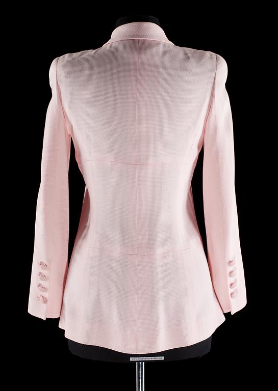 A pink jacket by Chanel.
