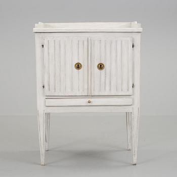 An early 19th century bedside table.