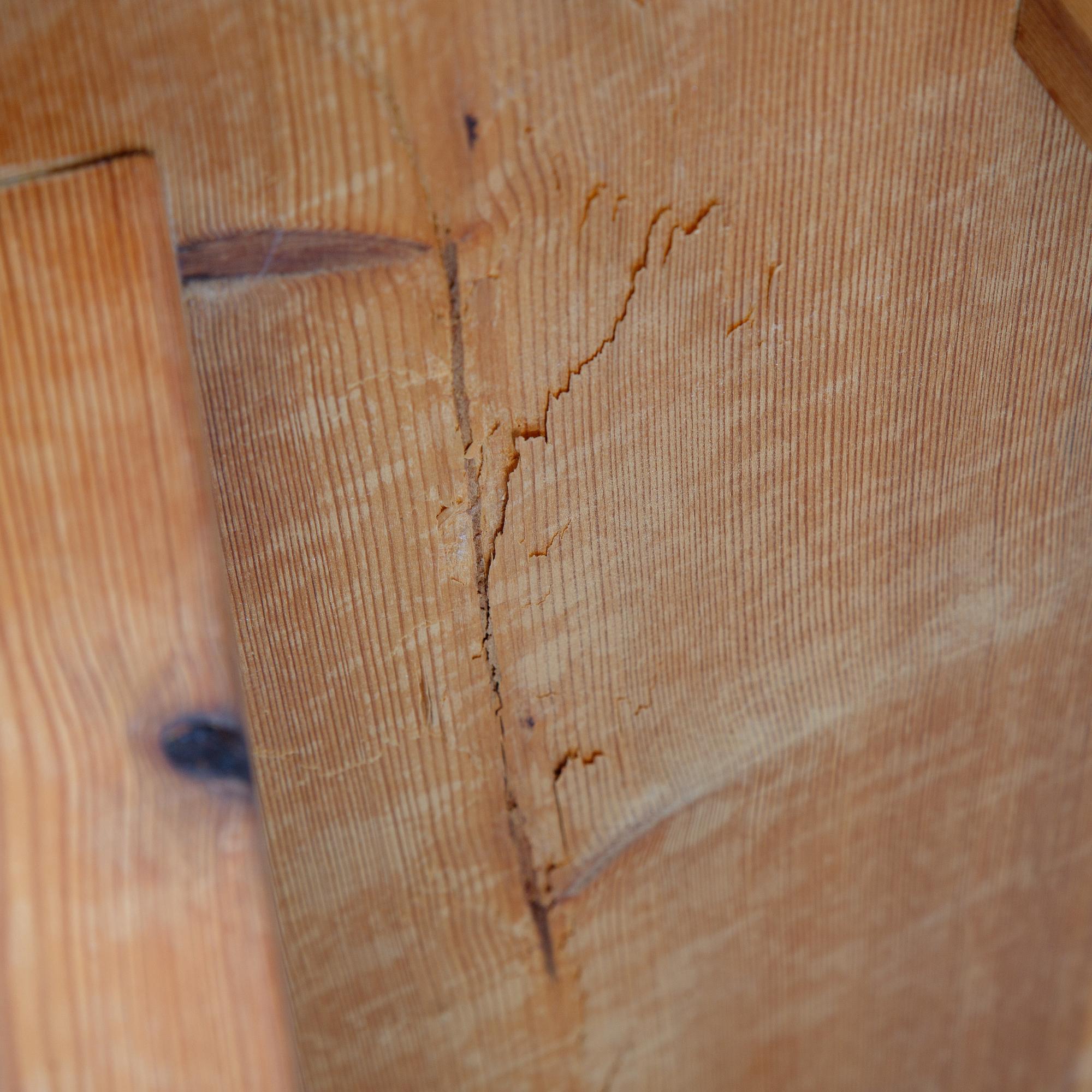 A pinewood stool, second half of the 20th Century.