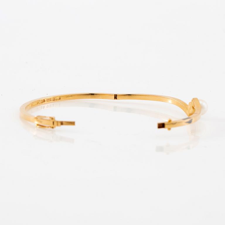 Armring, 18K guld och pärla, Stigbert, Stockholm, 1964.