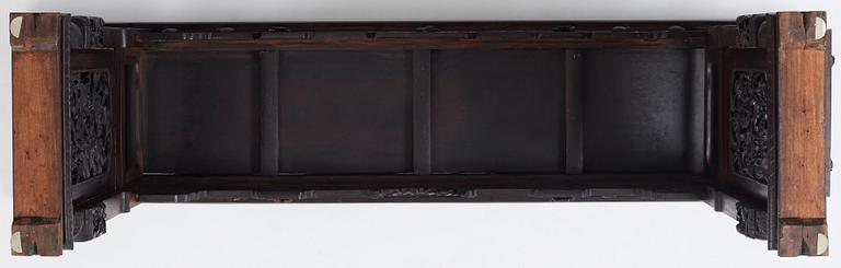 A massive zitan recessed-leg long table 'Jiaotousun Qiotouan', Qing dynasty, 19th century.