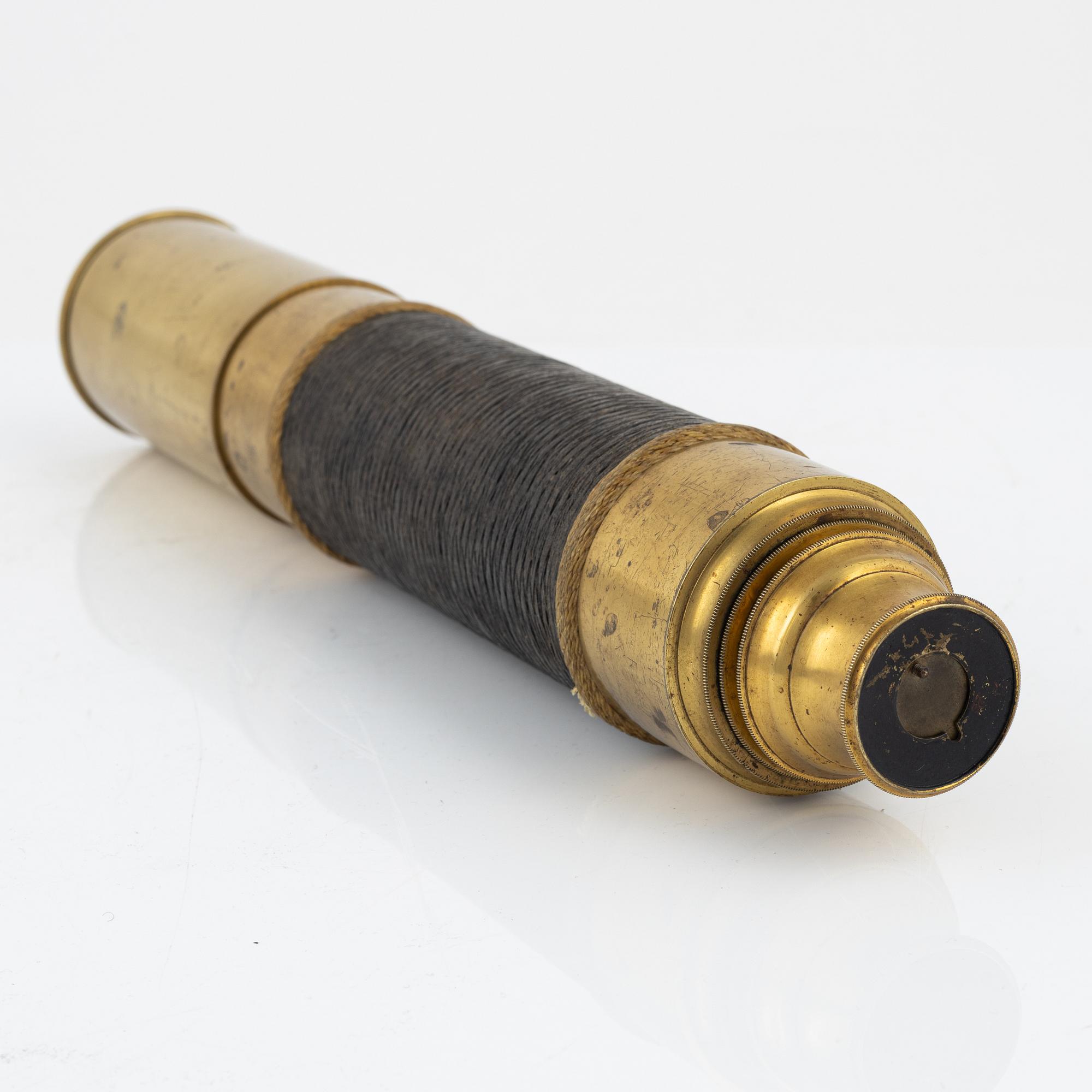 A brass telescope, around 1900.