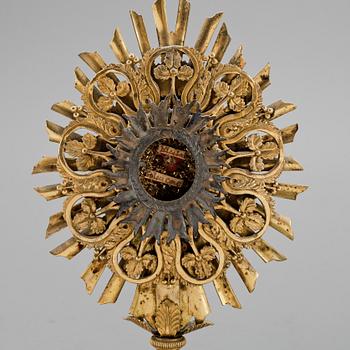 MONSTRANS förgylld mässing, empire, 1800-talets första hälft.