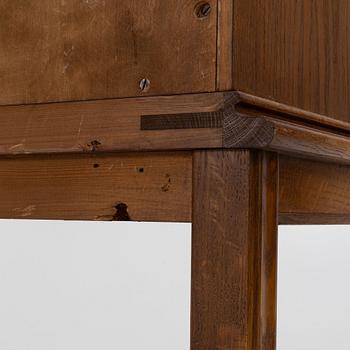 Oscar Nilsson, attributed to, a Swedish Modern oak cabinet, likely executed by Åfors Möbelfabrik, 1940s.