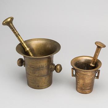 Two brass mortar and pestle.