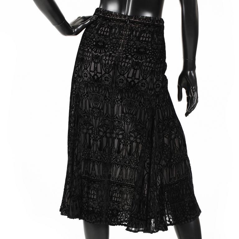 ALEXANDER MCQUEEN, a black skirt.