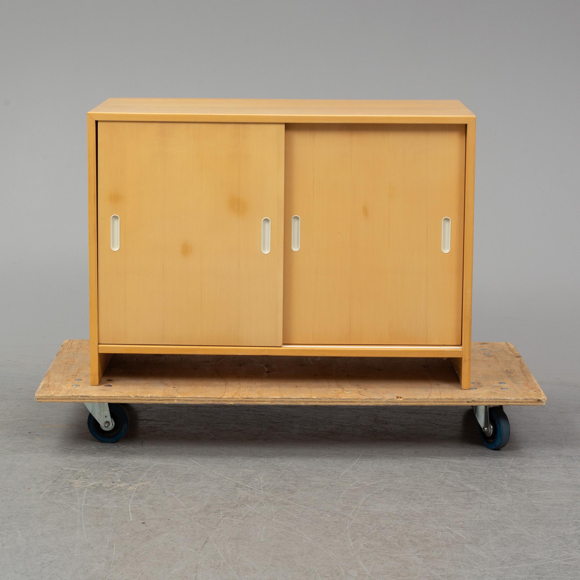 ALVAR AALTO, a model 217 birch cabinet from Artek, Finland.