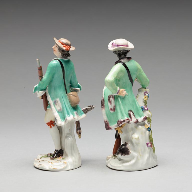 Two Meissen porcelain figures of huntsmen, 18th Century.
