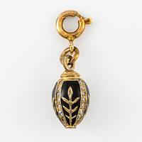 Pendant egg Fabergé, contemporary, silver with enamel and white stones.