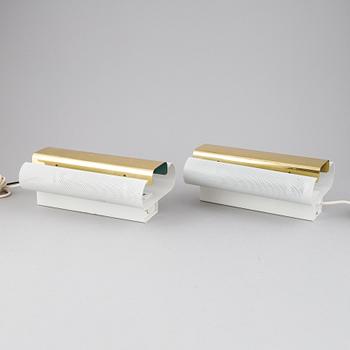 Hans-Agne Jakobsson, a pair of 'V-451/18L'/'Rasputin' brass wall lights from Markaryd.