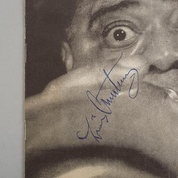 Autographs of Louis Armstrong with band.