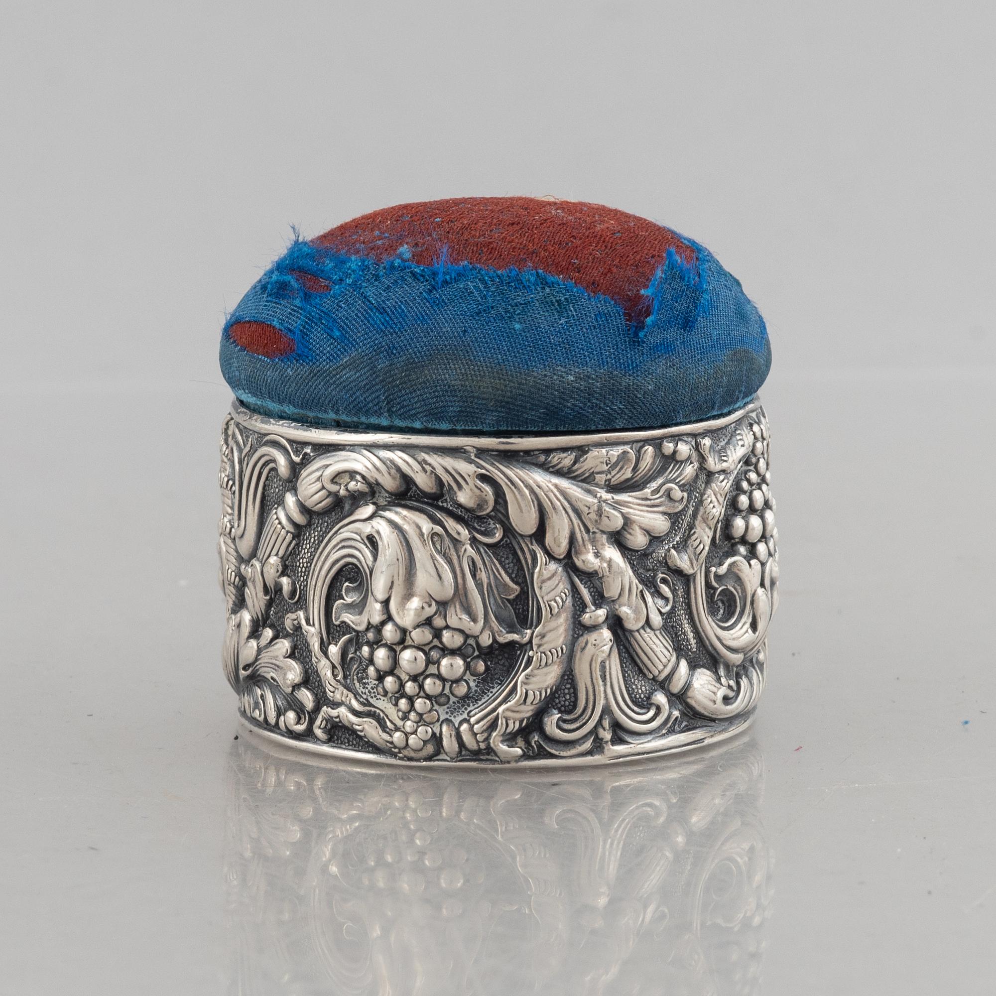 Tiffany & Co, a silver plated box with pin cushion lid.