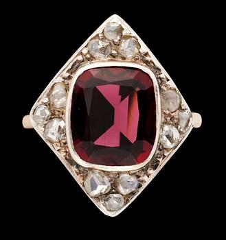 662. An antique garnet and diamond ring.