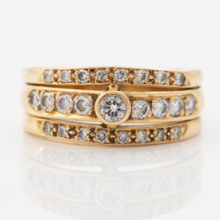 Ring 18K guld med runda briljantslipade diamanter.