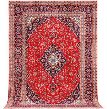 A Keshan carpet, c. 372 x 247 cm.