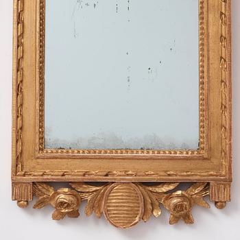 A Gustavian mirror, late 18th century.