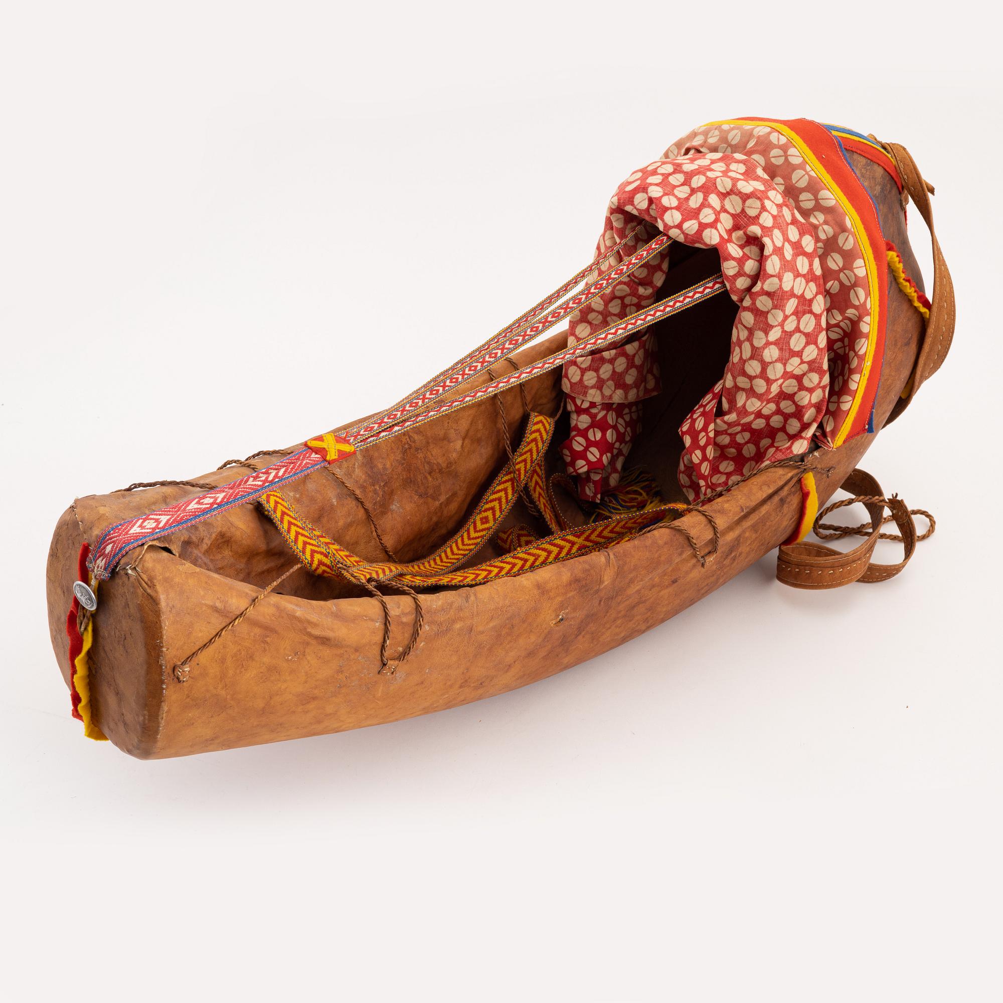 A Komsio, birch and leather, before 1959.